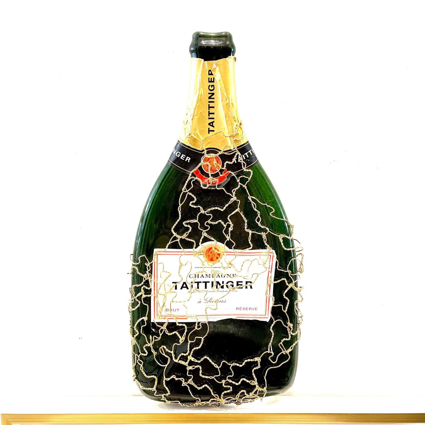 BOUTEILLE DE CHAMPAGNE EN VERRE FONDU Muselé or